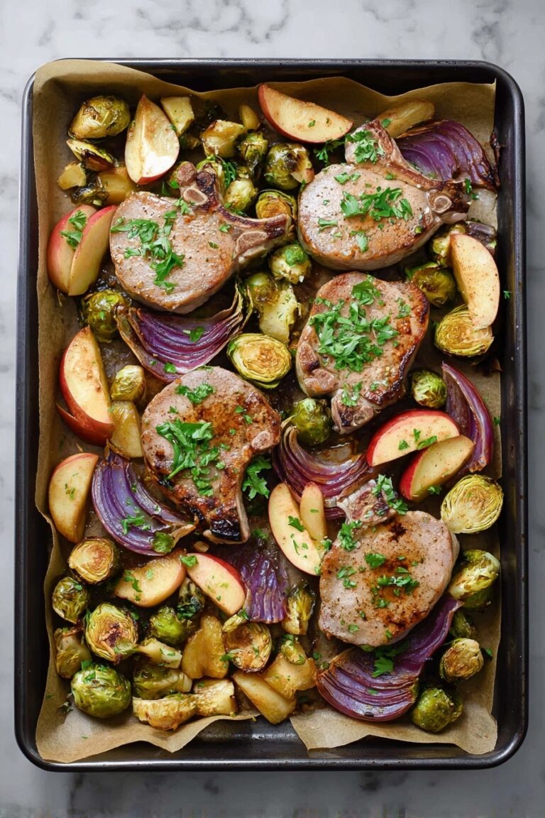 Sheet Pan Pork Chop Supper with Apple, Brussels Sprouts, and Sage Recipe