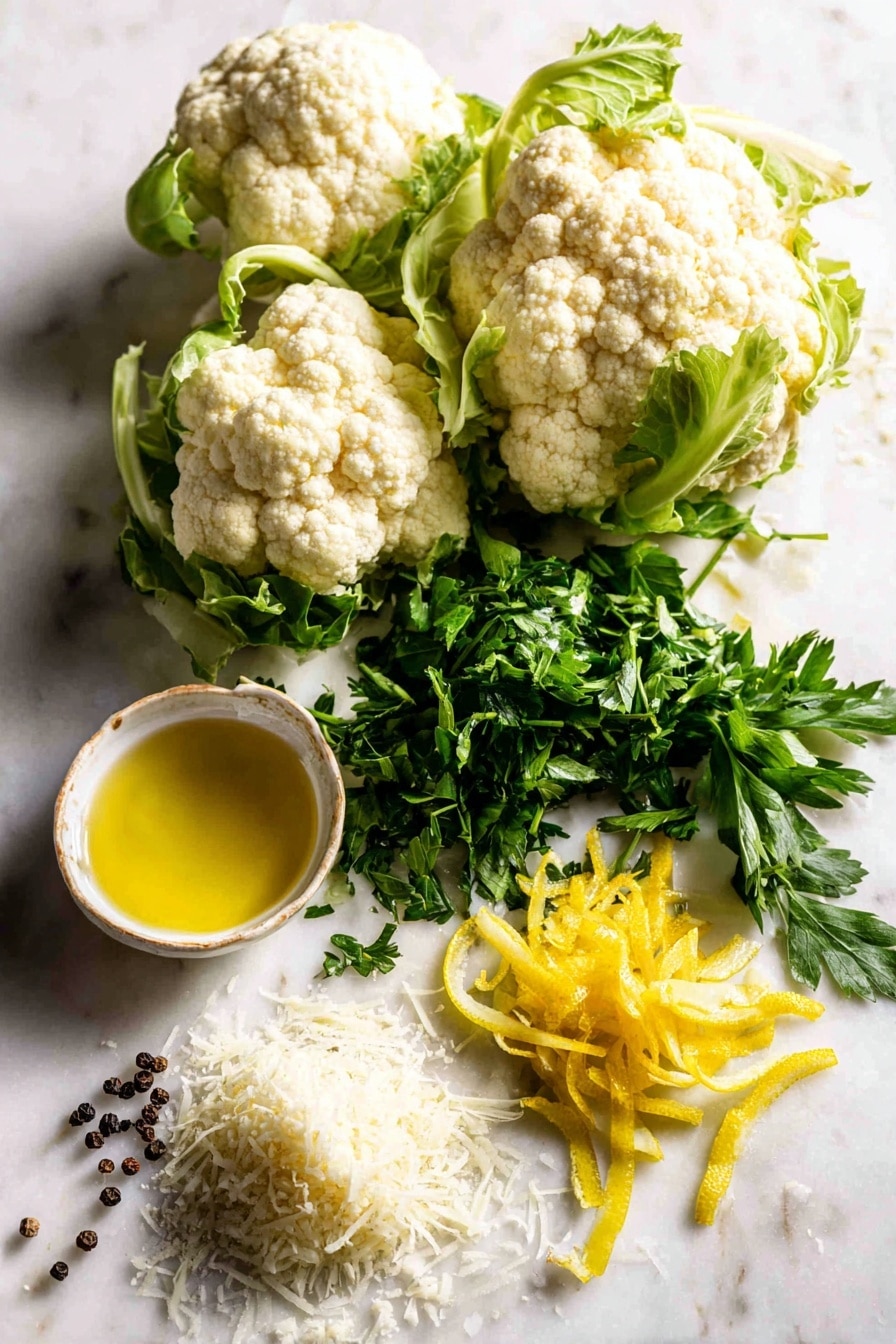 Roasted Cauliflower with Lemon, Parsley, and Parmesan, roasted cauliflower, lemon cauliflower side dish, healthy cauliflower recipes, flavorful vegetable sides, easy roasted cauliflower - Flat lay of fresh cauliflower florets with their creamy white curds and light green leaves, bright yellow lemon zest strips, a small bunch of vibrant green chopped parsley leaves, and a small pile of finely grated pale ivory Parmesan cheese, all naturally scattered with a few whole black peppercorns and glistening drops of golden extra-virgin olive oil, placed on white marbled surface, photo taken with an iphone --ar 2:3 --v 7