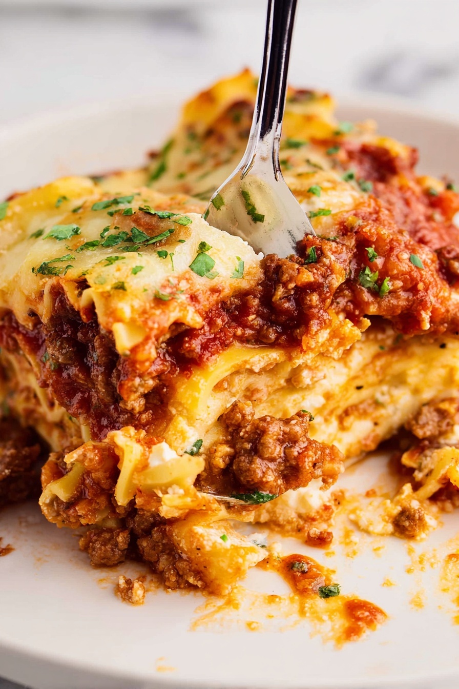 Cheesy Bolognese Lasagna, cheesy lasagna recipe, baked lasagna with bolognese, easy cheesy lasagna, Italian comfort food - A close-up of a fork lifting a piece of lasagna showing three distinct layers: the top layer has melted light yellow cheese with some green herb leaves scattered, below that is a thick rich red tomato meat sauce layer with browned ground meat, and at the bottom is creamy yellow lasagna pasta sheets mixed with bits of white ricotta cheese and small green herbs. The lasagna looks soft and juicy with sauce slightly spreading on a white plate, placed on a white marbled surface. photo taken with an iphone --ar 2:3 --v 7
