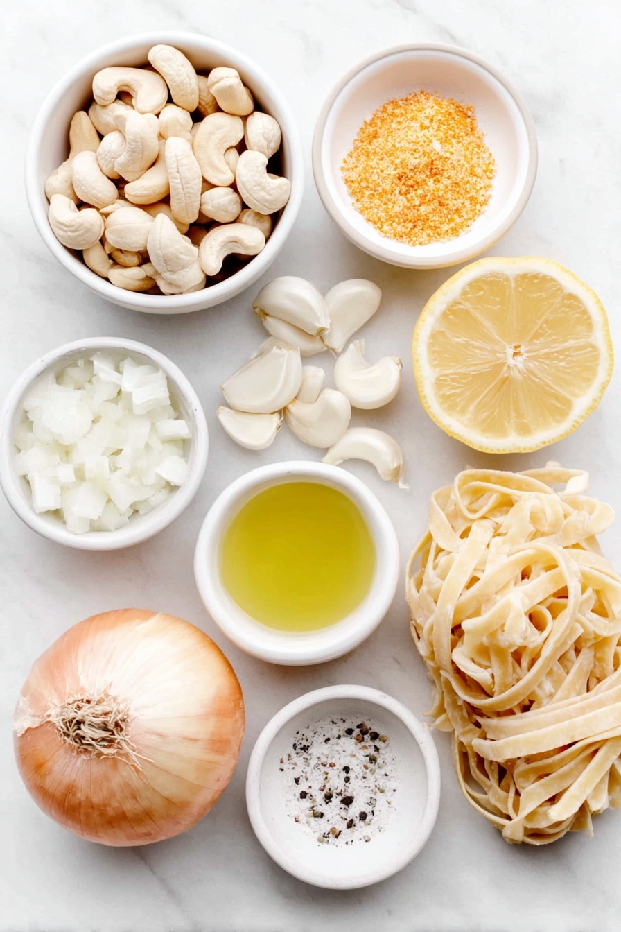 Vegan Cashew Alfredo Sauce, vegan Alfredo sauce, plant-based Alfredo, dairy-free Alfredo sauce, gluten-free Alfredo sauce - Flat lay of raw cashews in a small pile, a small white ceramic bowl of olive oil, half a medium sweet onion with some chopped pieces beside it, several peeled garlic cloves scattered naturally, a small white ceramic bowl filled with unsweetened almond milk, a small white ceramic bowl holding golden nutritional yeast flakes, a fresh lemon wedge next to a small white ceramic bowl containing lemon juice, a small white ceramic bowl of coarse salt, and a neatly arranged bundle of uncooked fettuccine pasta strands, all placed on a clean white marble surface, soft natural light, photo taken with an iPhone, professional food photography style, fresh ingredients, white ceramic bowls, no bottles, no duplicates, no utensils, no packaging --ar 2:3 --v 7 --p m7354615311229779997