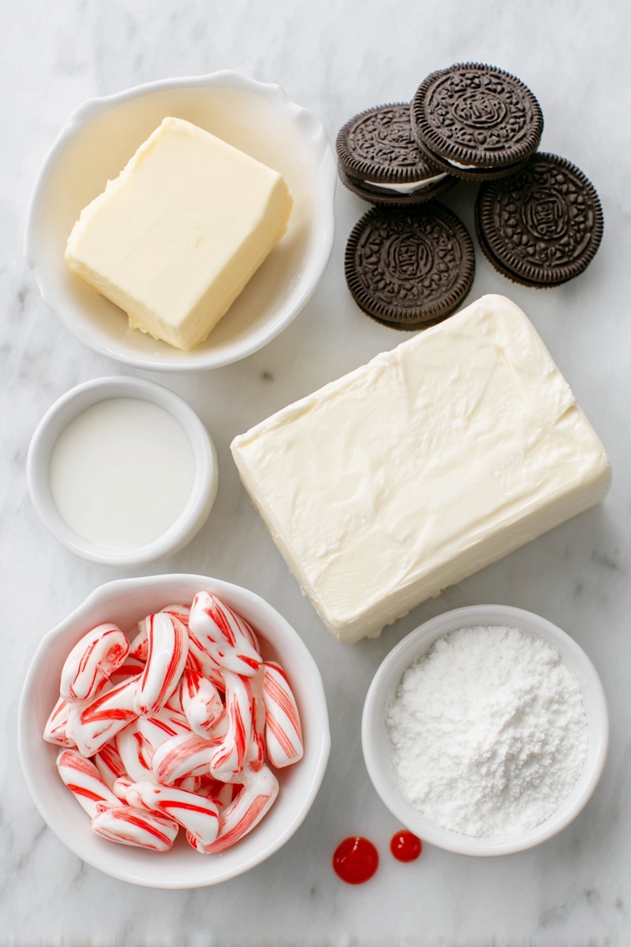 No Bake Peppermint Pie, peppermint dessert, easy holiday pie, no bake holiday treat, festive peppermint pie - Flat lay of a small pile of whole Oreos with visible cream filling, a handful of individually unwrapped red and white peppermint candy cane kisses, a small white ceramic bowl with melted unsalted butter, a block of full-fat cream cheese with smooth edges, a small white bowl filled with powdered sugar, a small white bowl of heavy cream, another small white bowl holding a clear vanilla extract liquid, a small white bowl with peppermint extract liquid, two small drops of vivid red food coloring on the white surface, all arranged symmetrically and proportionally in balance, placed on a clean white marble surface, soft natural light, photo taken with an iPhone, professional food photography style, fresh ingredients, white ceramic bowls, no bottles, no duplicates, no utensils, no packaging --ar 2:3 --v 7 --p m7354615311229779997