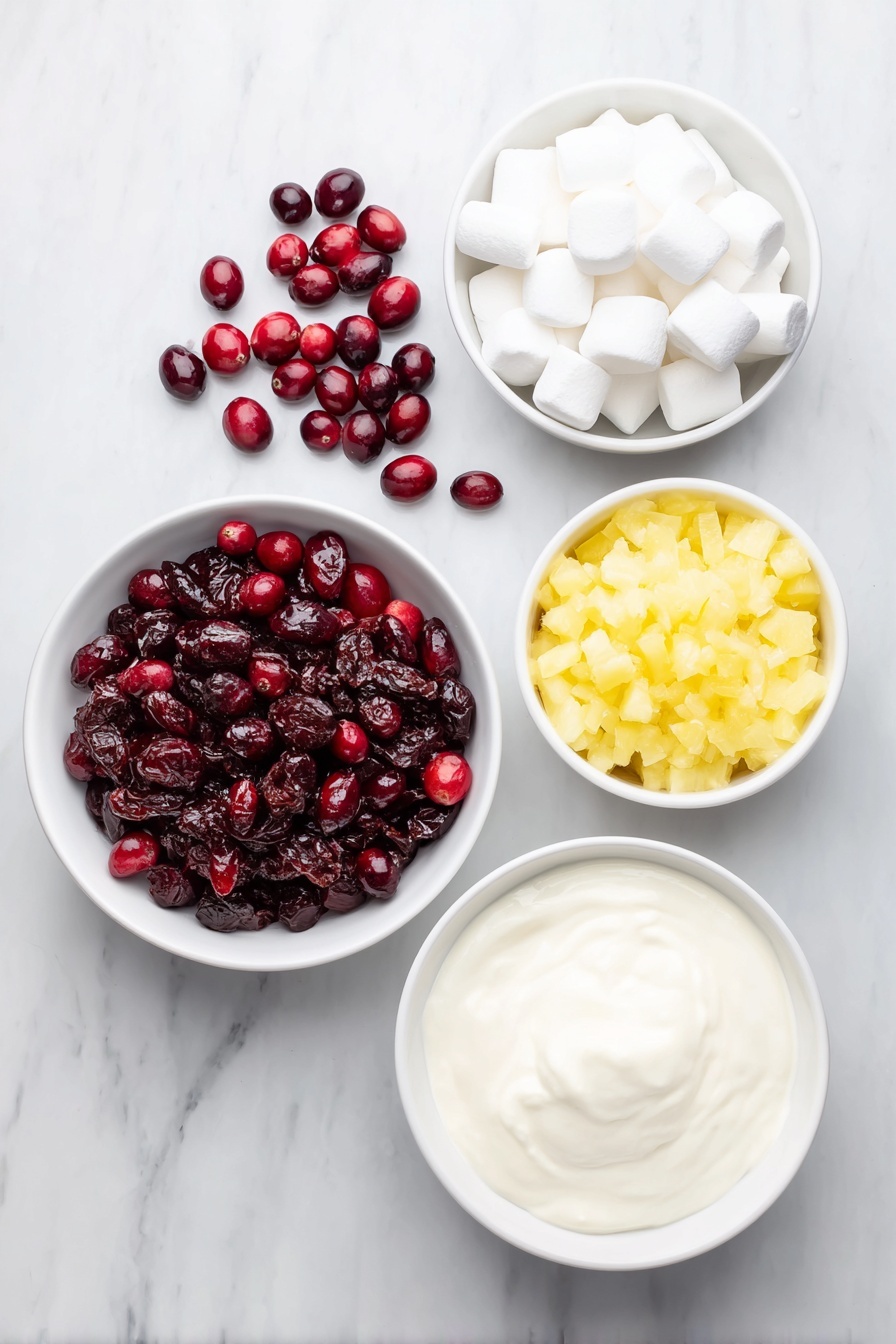 Cranberry Fluff Salad, Cranberry Fluff Salad recipe, holiday cranberry salad, easy fruit salad, festive side dish - Flat lay of fresh whole cranberries scattered in a small pile, a small white ceramic bowl filled with granulated sugar, a small white ceramic bowl holding bright yellow crushed pineapple pieces, a small pile of soft white mini-marshmallows, and a small white ceramic bowl of thick heavy cream placed alongside, all arranged symmetrically on a clean white marble surface, soft natural light, photo taken with an iPhone, professional food photography style, fresh ingredients, white ceramic bowls, no bottles, no duplicates, no utensils, no packaging --ar 2:3 --v 7 --p m7354615311229779997