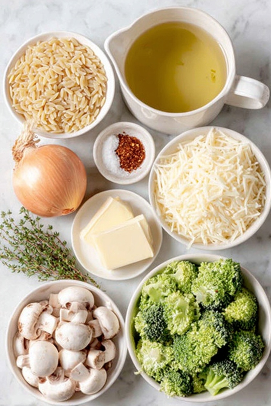 Cheesy Broccoli Orzo Bake, Broccoli orzo casserole, cheesy baked pasta with broccoli, easy broccoli and cheese bake, creamy vegetable pasta bake - Flat lay of a small white ceramic bowl of extra virgin olive oil, a whole yellow onion peeled with top and root ends visible, a small white ceramic bowl filled with roughly chopped fresh white mushrooms, two tablespoons of salted butter on a simple white ceramic dish, a small mound of dry orzo pasta scattered neatly, a small white ceramic bowl with fresh green thyme leaves, a small white ceramic bowl of clear vegetable broth, a small white ceramic bowl holding dry white wine, a heap of bright green broccoli florets, a fresh glossy bay leaf, a small white ceramic bowl with a fine white powder of garlic powder, a small white ceramic bowl with vibrant red cayenne pepper powder, half a lemon with fresh zest visible, a small white ceramic bowl of whole milk, a small white ceramic bowl with shredded sharp cheddar cheese, a small white ceramic bowl with grated asiago cheese, a few sprigs of fresh basil, all arranged with perfect symmetry and balanced proportions, placed on a clean white marble surface, soft natural light, photo taken with an iPhone, professional food photography style, fresh ingredients, white ceramic bowls, no bottles, no duplicates, no utensils, no packaging --ar 2:3 --v 7 --p m7354615311229779997