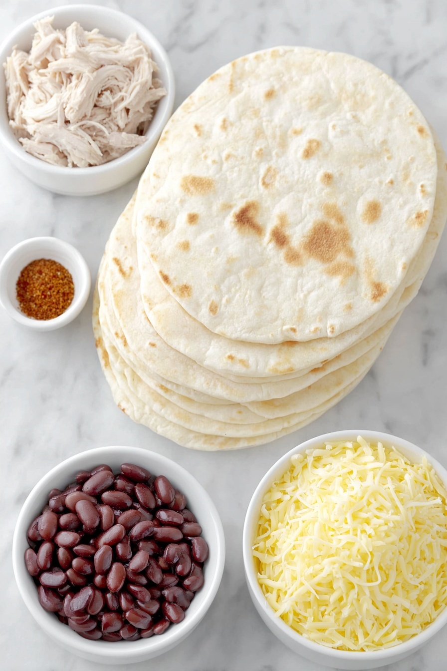 Burrito Ring with Chicken and Cheese, burrito ring recipe, Mexican appetizer ideas, cheesy chicken ring, party finger food recipes - Flat lay of soft flour tortillas stacked in a neat pile, a small mound of cooked shredded chicken showing tender texture, a handful of golden shredded Mexican blend cheese, a white ceramic bowl filled with smooth refried beans, another small white bowl containing taco seasoning with vibrant red and orange tones, and a clean white ceramic bowl holding shredded queso quesadilla cheese, all arranged symmetrically and balanced, placed on a clean white marble surface, soft natural light, photo taken with an iPhone, professional food photography style, fresh ingredients, white ceramic bowls, no bottles, no duplicates, no utensils, no packaging --ar 2:3 --v 7 --p m7354615311229779997