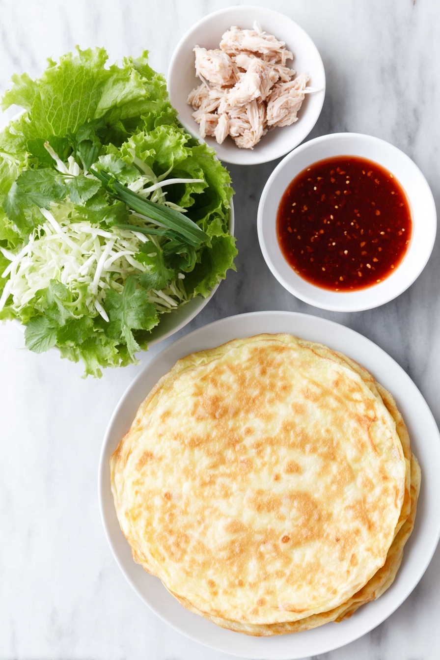 Asian Crunch Chicken Salad with Crispy Egg Roll Bases, Asian chicken salad, crispy egg roll salad, healthy Asian chicken salad, flavorful Asian salad - Flat lay of a crisp stack of golden fried egg roll wrappers, a heap of fresh mixed Asian salad greens with shredded cabbage, a few whole cooked chicken tenders glistening with bright red sweet chili sauce, and a small white ceramic bowl filled with glossy sweet chili sauce, all arranged in perfect symmetry on a simple white ceramic plate and bowls, placed on a clean white marble surface, soft natural light, photo taken with an iPhone, professional food photography style, fresh ingredients, white ceramic bowls, no bottles, no duplicates, no utensils, no packaging --ar 2:3 --v 7 --p m7354615311229779997