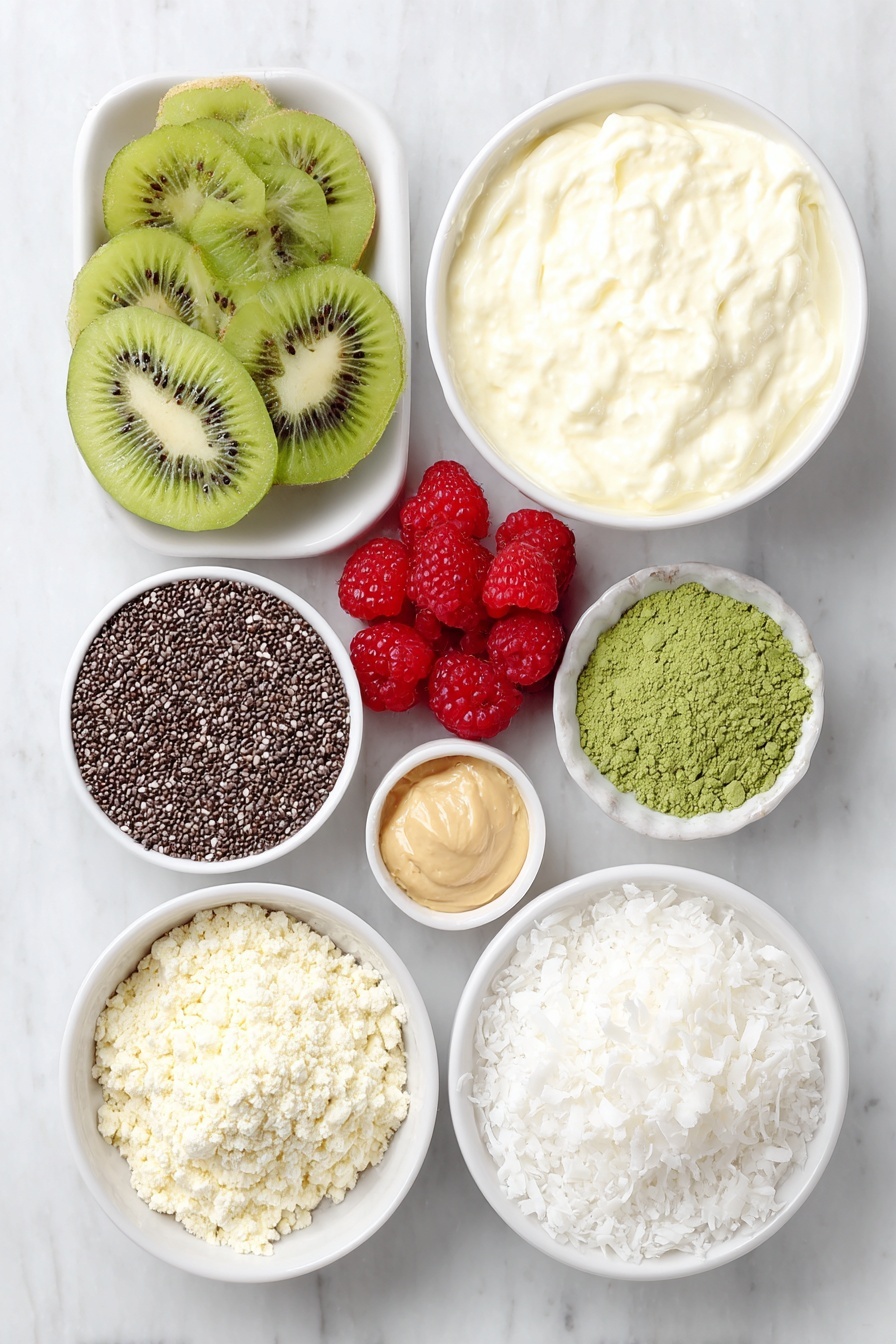 Matcha Protein Chia Pudding, healthy matcha breakfast, vegan chia pudding, high-protein superfood snack, easy overnight chia pudding - Flat lay of fresh creamy nonfat Greek yogurt in a simple white ceramic bowl, a small white bowl of smooth plant-based milk, a neat pile of glossy black chia seeds on the white surface, a small mound of vibrant green matcha powder, a small white bowl with light beige vanilla extract, a half scoop of fine vanilla whey protein powder shaped into a small mound, a few plump red raspberries, a couple of bright sliced strawberries, a few vibrant green kiwi slices arranged naturally, a small white bowl with creamy almond butter, a small white bowl filled with white coconut flakes, all perfectly arranged with balanced spacing and symmetry, placed on a clean white marble surface, soft natural light, photo taken with an iPhone, professional food photography style, fresh ingredients, white ceramic bowls, no bottles, no duplicates, no utensils, no packaging --ar 2:3 --v 7 --p m7354615311229779997