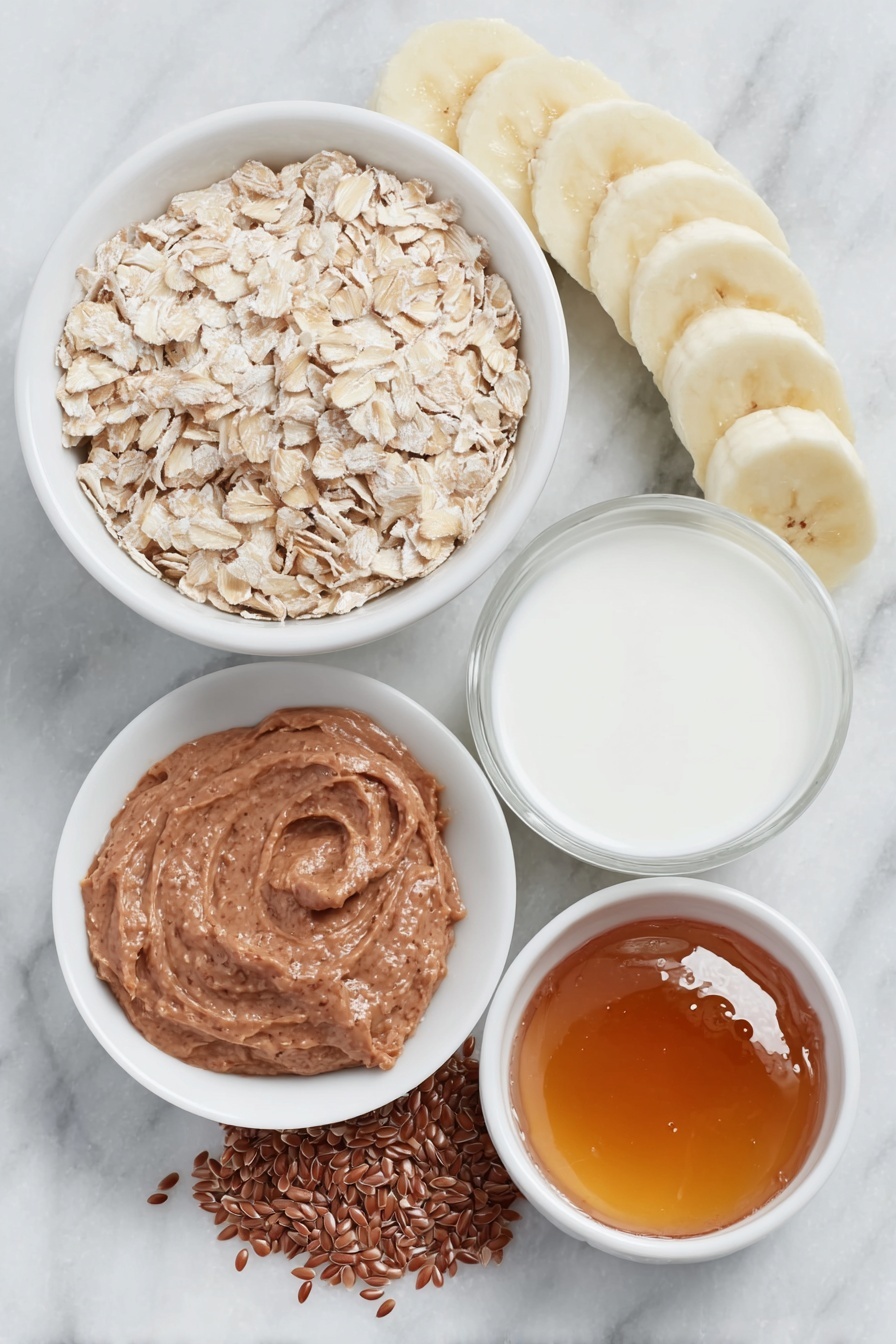 Peanut Butter Banana Overnight Oats, healthy overnight oats with peanut butter, quick breakfast ideas, banana oats recipe, nutritious breakfast recipes - Flat lay of a small mound of rolled oats, a teaspoon of whole flax seeds, a light dusting of ground cinnamon beside a small white ceramic bowl of milk, a small white ceramic bowl filled with amber maple syrup, a dollop of creamy peanut butter on the side, and a perfectly ripe half banana sliced into neat pieces arranged next to the ingredients, all placed on a clean white marble surface, soft natural light, photo taken with an iPhone, professional food photography style, fresh ingredients, white ceramic bowls, no bottles, no duplicates, no utensils, no packaging --ar 2:3 --v 7 --p m7354615311229779997
