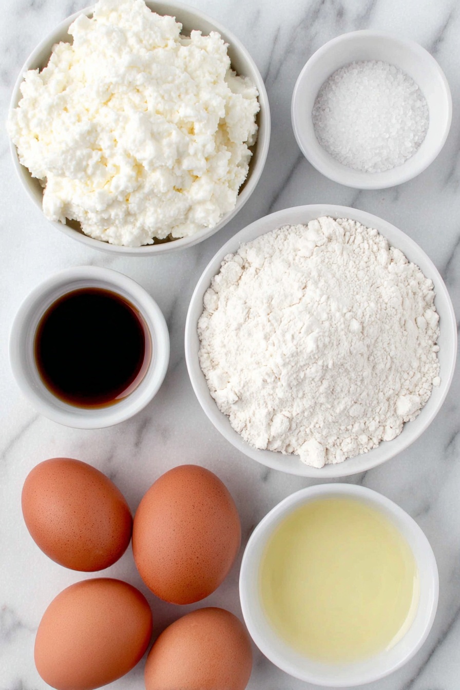 Cheese Cottage Pancakes, cottage cheese pancakes, fluffy cheese pancakes, easy breakfast recipes, cheese pancake ideas - Flat lay of a small mound of fresh white cottage cheese, four whole brown eggs with clean shells, a small white bowl of golden vanilla extract, a small white bowl of fine white sugar crystals, a small white bowl of powdery white baking powder, a small pile of sifted white flour, and a small white bowl filled with pale yellow canola oil, all arranged symmetrically on a clean white marble surface, soft natural light, photo taken with an iPhone, professional food photography style, fresh ingredients, white ceramic bowls, no bottles, no duplicates, no utensils, no packaging --ar 2:3 --v 7 --p m7354615311229779997